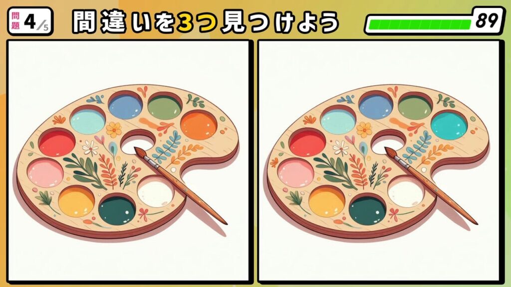 #252　問題4　間違い探し　木製の絵の具パレットの上に筆が1本置かれている。